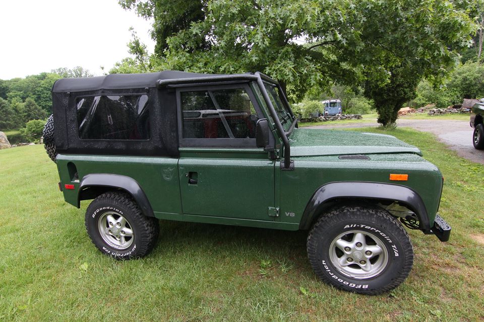 An alternate view of the green 1994 Land Rover Defender 90
