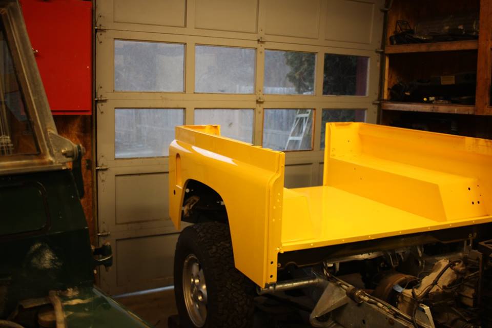 The body panels were stripped to bare aluminum and repainted in AA Yellow Glasurit which is an extremely high quality paint.
