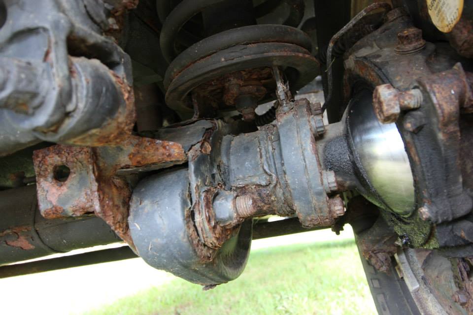 The axle housings and suspension mounts are also badly rotted.