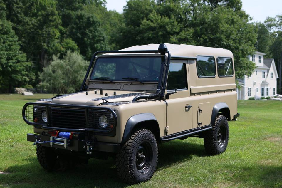The Land Rover shown with its hardtop installed. We installed side and rear windows for added visibility.