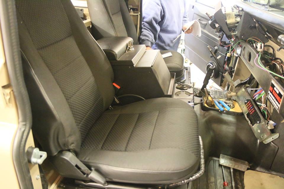 New genuine Land Rover Puma heated seats and Tuffy locking center console are installed.
