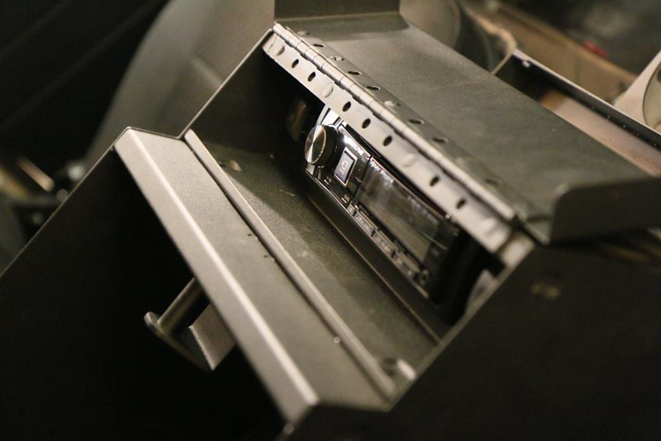 The Tuffy center console has a locking radio slot.